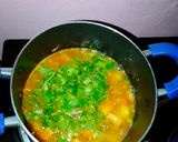 A picture of step 9 of Boiled rice served with minji stew and potatoes.