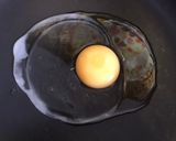 A picture of step 1 of Cheesy egg toast.