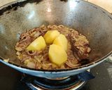 A picture of step 5 of Onion Tomato Chicken.