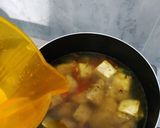 Foto langkah ke 5 dari resep Semur ikan tahu bawang daun.