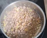 A picture of step 3 of Creamy Tomato Penne with Pork and Basil.