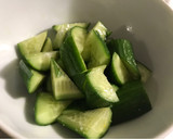 A picture of step 5 of Taro, Sweet Potato, Cucumber, and Cranberry Salad (with Egg and Fresh Basil).