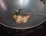 A picture of step 2 of Lemon rice and prawn curry.
