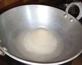 A picture of step 2 of Kakara Pitha.