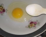A picture of step 1 of Egg cheese roll.