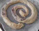 A picture of step 9 of Large Ensaimada (v4) Filled with Chocolate Hazelnut Spread.