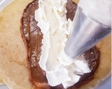 Foto del paso 2 de la receta: Filloas rellenas de fresas, nata y dulce de leche