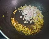 A picture of step 2 of Masoor Dal with Tomato and Curry Leaf Tadka.