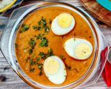 A picture of step 8 of Egg Masala Curry.