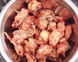 A picture of step 5 of Nasi Lemak (coconut milk rice, chicken gravy and fried chicken).