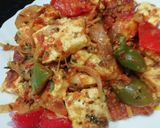 A picture of step 7 of Chilli Paneer with red capsicum.