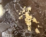 A picture of step 1 of Mussels in a garlic tomato sauce.
