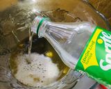 A picture of step 2 of Pineapple mock tail.