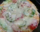 A picture of step 16 of Double decker Chole Pizza.