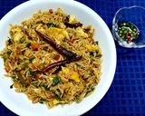 A picture of step 4 of Singapore Egg Fried Rice.