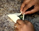 A picture of step 10 of Zingy Spinach Parcels.
