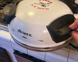 Foto del passaggio 4 della ricetta Pizza romana al basilico per fornetto Ariete