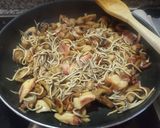 Foto del paso 7 de la receta: Salteado de pulpo con gulas y verduras