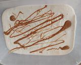 A picture of step 8 of Lotus Biscoff Ice cream.