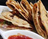 A picture of step 5 of Roti Pizza Wrap.