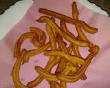 A picture of step 5 of Churros with chocolate sauce.