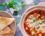 Foto langkah ke 7 dari resep Shakshouka (ceplok telur dalam saus tomat).