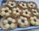 Foto langkah ke 2 dari resep Roti bunga isi coklat.