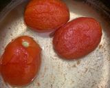 A picture of step 4 of Sweet and sour Tomato Curry serve with white rice.