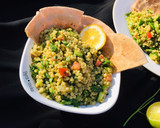 A picture of step 16 of Tabbouleh salad with a twist.