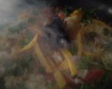 A picture of step 5 of Veg biryani with smoky effect.
