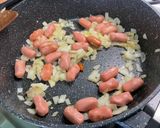 A picture of step 6 of Mini Pork Sausages with Red Pesto, Garlic, Onion, and Oregano.