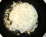 A picture of step 6 of Thai Pineapple Fried Rice.