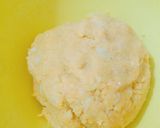 A picture of step 2 of Corn cheese stuffed flattened rice balls.