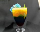 A picture of step 3 of Devil's Knight Layered Mocktail.