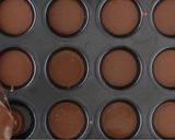 A picture of step 6 of Mochi Brownies in a Muffin Tin.