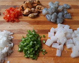 Foto del paso 3 de la receta: Arroz negro con mariscos