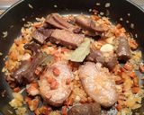 Foto del paso 3 de la receta: Arroz meloso con alcachofas y conserva de cerdo