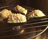A picture of step 6 of Zucchini stuffed with cheesy Guacamole.