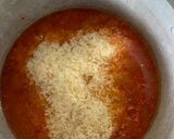 A picture of step 5 of Nigerian Jollof Rice and Grilled Chicken.