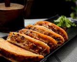 A picture of step 9 of Cheesy Potato Tacos.