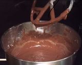 A picture of step 5 of Moist 2 layer Red Velvet Cake.
