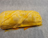 Foto del paso 5 de la receta: Solomillo en hojaldre con panceta, queso y piquillos