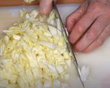 A picture of step 1 of Coleslaw salad with plant-based dressing.