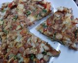 A picture of step 6 of Omlate bread pizza😜😊.