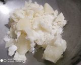 A picture of step 3 of Ground Til Coconut Mix Chikki.