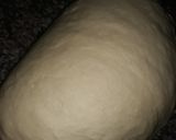 A picture of step 1 of Doughnut coated in sugar.