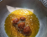 A picture of step 4 of Gulgule (dry fruits flavoured).