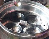 A picture of step 3 of Paruppu urundai kuzhambu.