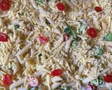 A picture of step 3 of Penne pasta in white sauce.