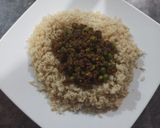 A picture of step 3 of Matar qeema with brown rice.